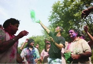 Maxwell pictures playing holi.